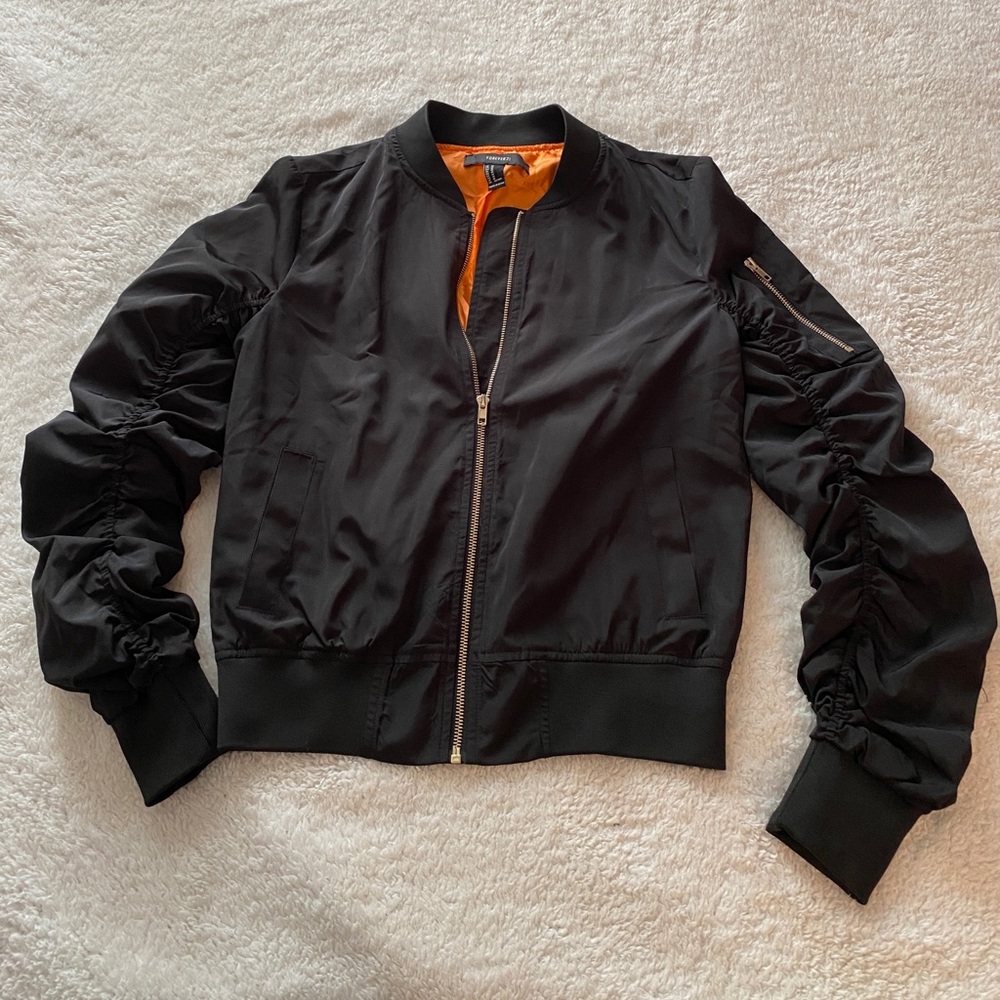Black puffy bomber jacket